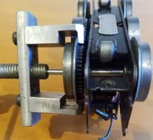 A typical Lionel Hudson, Praire or Adriatic engines. Pull wheel with gear on back first off the axle then you can pull the wheel and axle out to pull other wheel off.