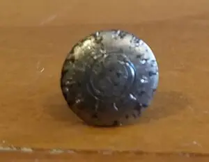 Top of rivet after being removed. See marks from teeth digging in.