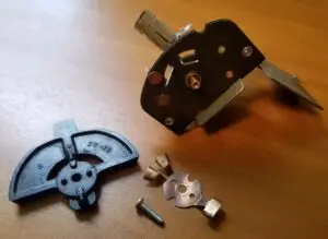 Lift Switch a little & remove screw. Service Switch & reinstall.