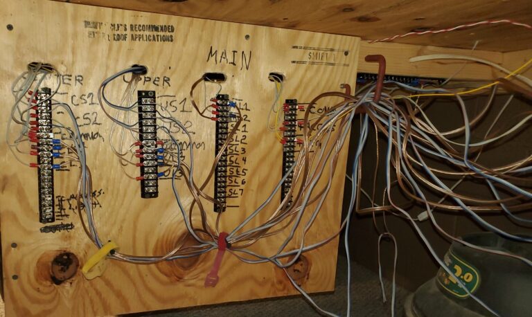 A mess of wires coming down from the Main Controls.